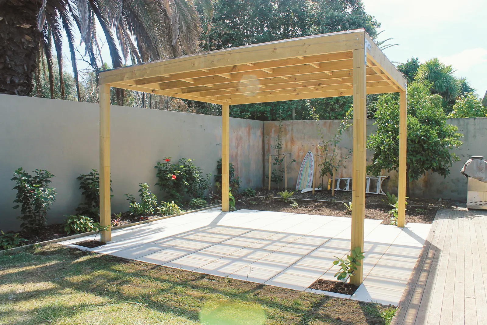 Paved patio under a timber pergola